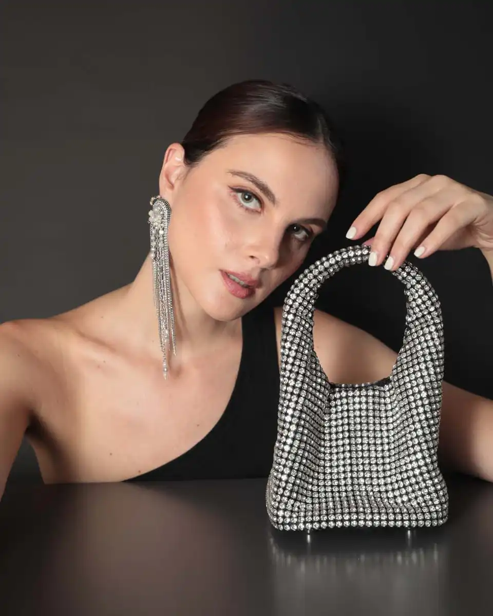 Crafted from apple leather and encrusted with high-quality rhinestones
